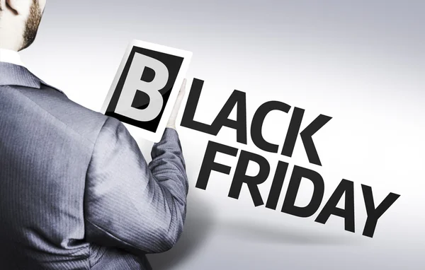 Forretningsmann med teksten Black Friday i et konseptbilde – stockfoto