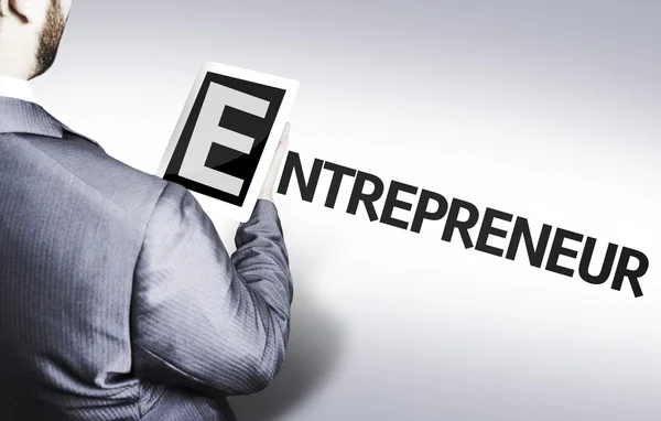 Homem de negócios com o texto Empreendedor em uma imagem de conceito — Fotografia de Stock