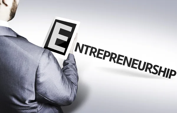 Business man with the text Entrepreneurship in a concept image — Stock Photo, Image