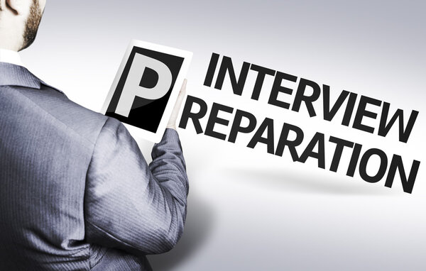 Business man with the text Interview Preparation in a concept image