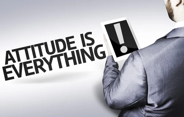 Hombre de negocios con el texto La actitud lo es todo en una imagen conceptual —  Fotos de Stock