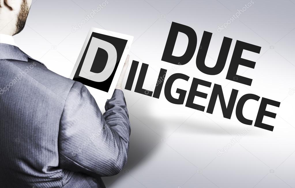 Business man with the text Due Diligence in a concept image