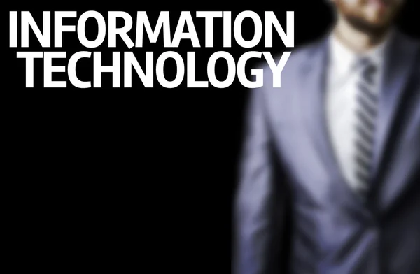 Tecnología de la información escrita en un tablero con un hombre de negocios — Foto de Stock