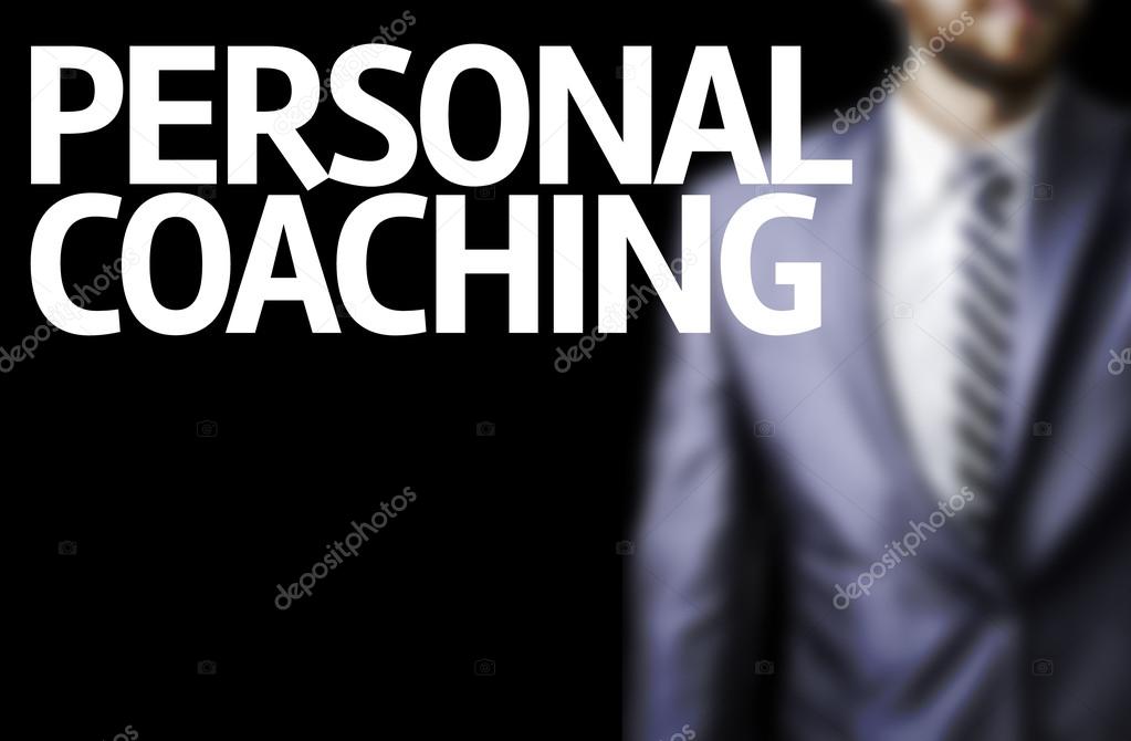Personal Coaching written on a board with a business man