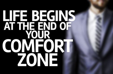 Life Begins at the end of Your Comfort Zone written on a board clipart