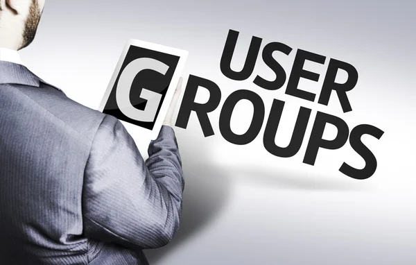 Empresario con el texto Grupos de usuarios — Foto de Stock