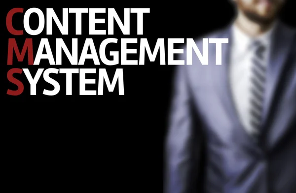 Content managementsysteem geschreven op een bord met een zakenman — Stockfoto