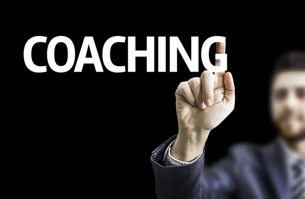 Hombre de negocios señalando el texto: Coaching —  Fotos de Stock