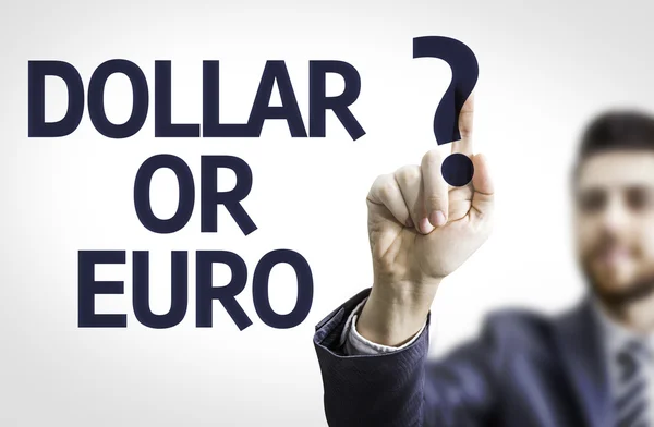 Business man pointing the text: Dollar or Euro? — Stock Photo, Image