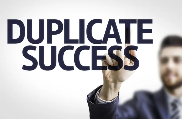 Homme d'affaires pointant le texte : Duplicate Success — Photo