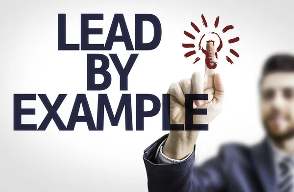 Business man pointing the text: Lead By Example — Stock Photo, Image