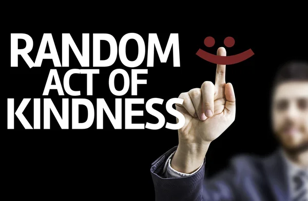 Zakenman wijzen de tekst: willekeurige daad van vriendelijkheid — Stockfoto