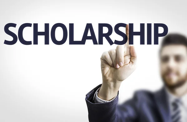 Business man pointing the text: Scholarship — Stock Photo, Image