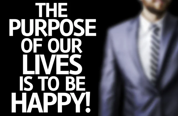 Syftet med våra liv är att vara lycklig skriven på ett bräde — Stockfoto