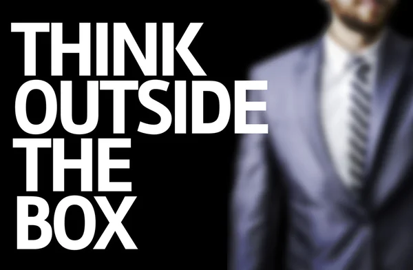 Think Outside The Box written on a board — Stock Photo, Image