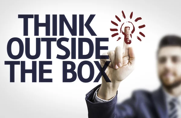 Board with text: Think Outside The Box — Stock Photo, Image