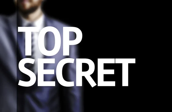 Top Secret escrito en un tablero con un hombre de negocios —  Fotos de Stock