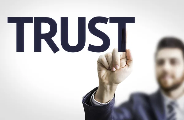 Business man pointing the text: Trust — Stock Photo, Image