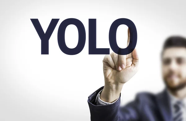 Styrelsen med text: Yolo (du lever bara en gång) — Stockfoto