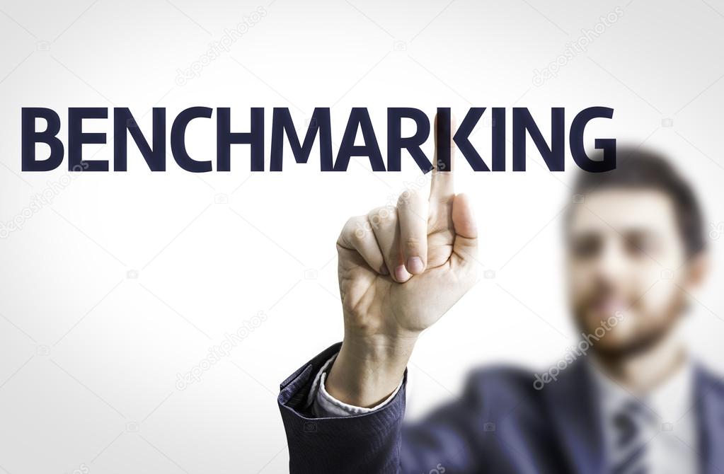 Businessman with text: Benchmarking
