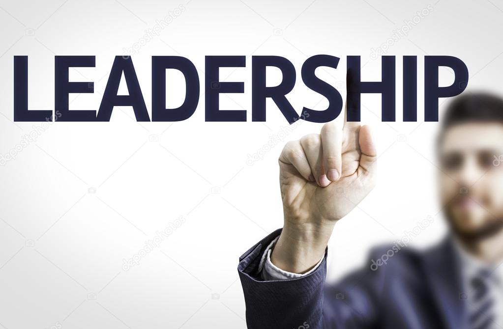 Business man pointing the text: Leadership