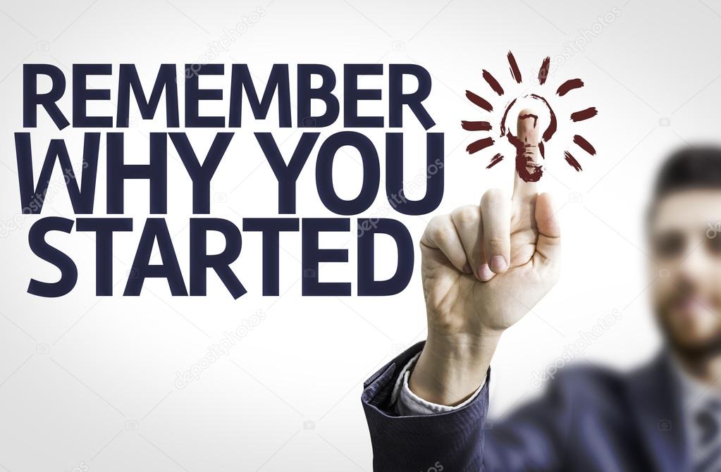 Business man pointing the text: Remember Why You Started