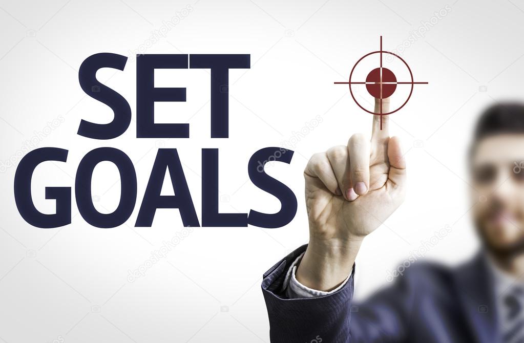 Business man pointing the text: Set Goals