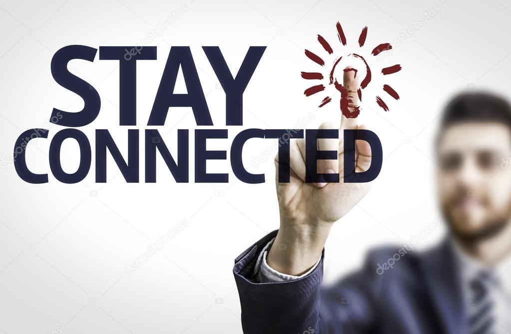 Business man pointing the text: Stay Connected