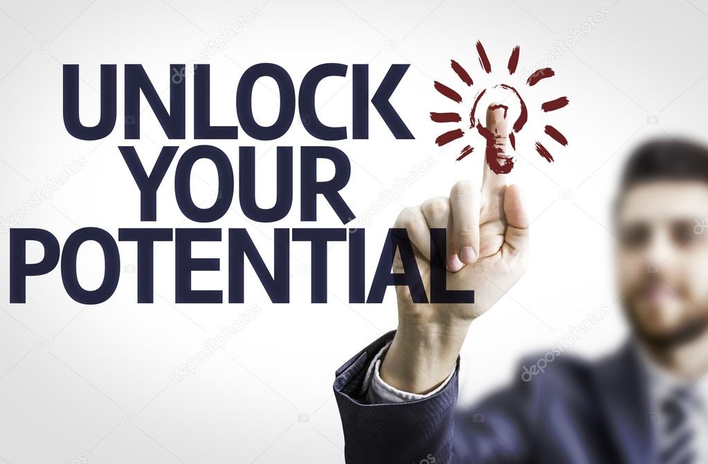 Business man pointing the text: Unlock Your Potential