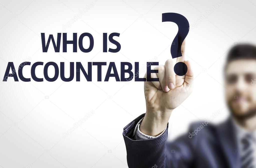 Business man pointing the text: Who is Accountable?
