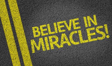 Believe in Miracles! written on road clipart