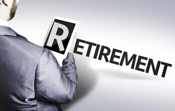 Business man with the text Retirement in a concept image — Stock Photo, Image