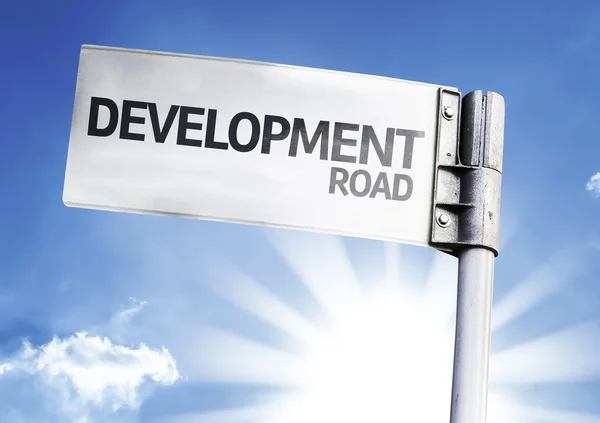 Development road sign — Stock Photo, Image