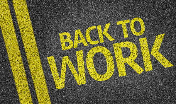 Back To Work written on road