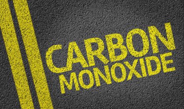 Carbon Monoxide written on road clipart