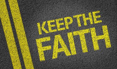 Keep the Faith written on the road clipart