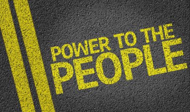 Power to the People written on the road clipart