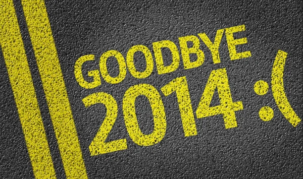 Goodbye 2014 :( written on the road — Stock Photo, Image
