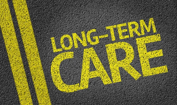 Long-Term Care written on the road — Stock Photo, Image