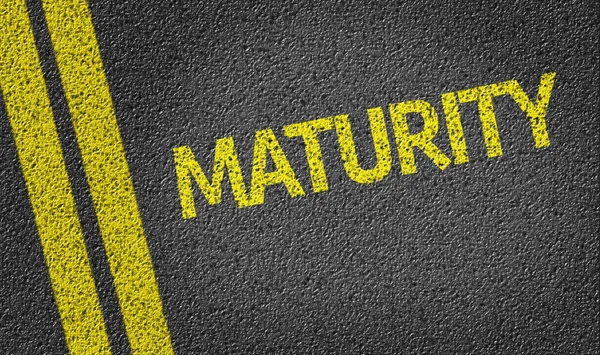 Maturity written on the road — Stock Photo, Image