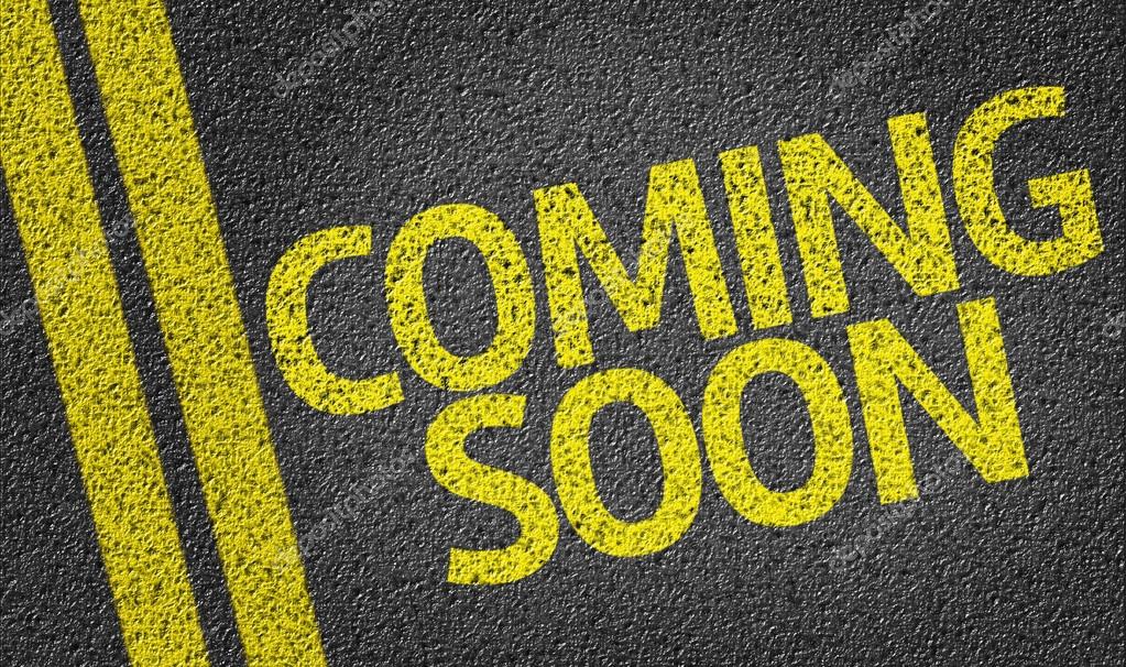 Coming Soon written on the road background