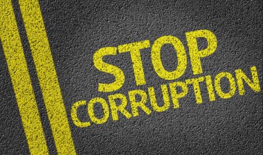 Stop Corruption written on the road clipart