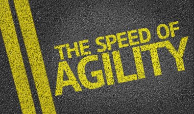 The Speed of Agility written on the road clipart