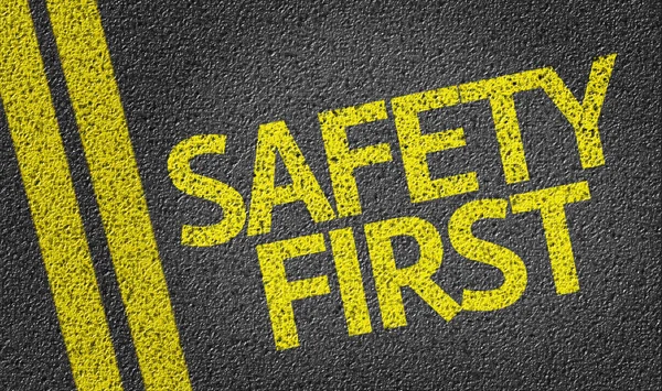 Safety First written on the road — Stock Photo, Image