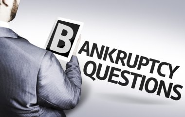 Business man with the text Bankruptcy Questions clipart