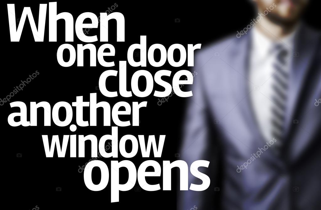When one door close another window opens written on a board with a business man