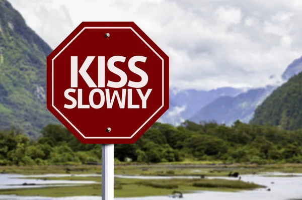 Kiss Slowly red sign — Stock Photo, Image