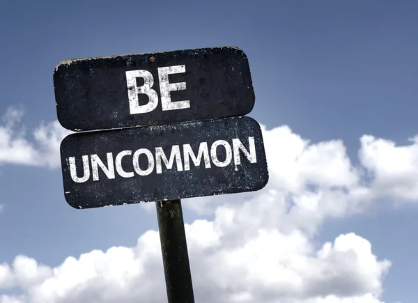 Be Uncommon  sign — Stock Photo, Image