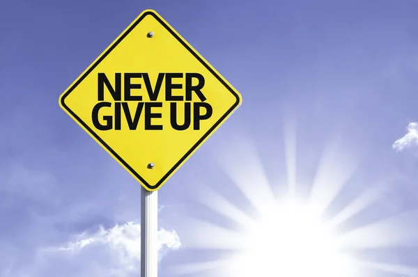 Never Give up  road sign — Stock Photo, Image