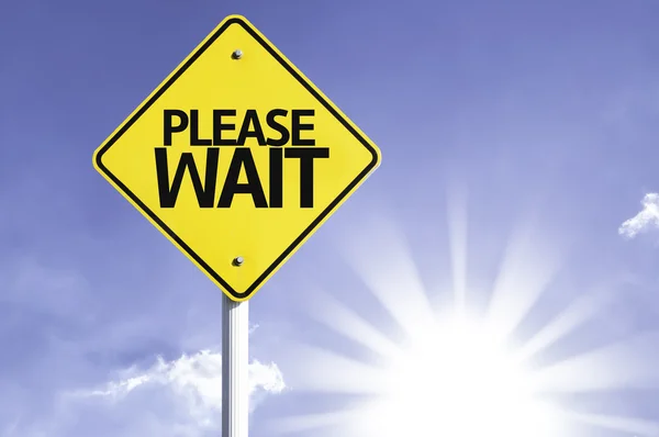 Please wait   road sign — Stock Photo, Image